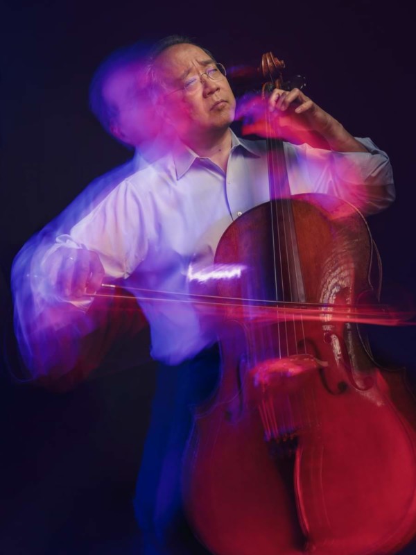 Cellist Yo-Yo Ma playing a cello