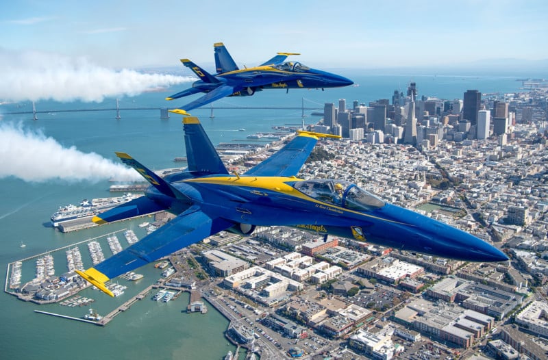 Lt. Ryan Chamberlain (below) and CDR Frank Weisser (above) fly U.S. Navy Blue Angels numbers 5 and 6 over San Francisco, California as part of a practice run for Fleet Week on October 06, 2016. On June 02, Capt. Jeff Kuss, pilot for Blue Angel Number 6, was killed during a Split S maneuver ahead of an air show in Tennessee. 