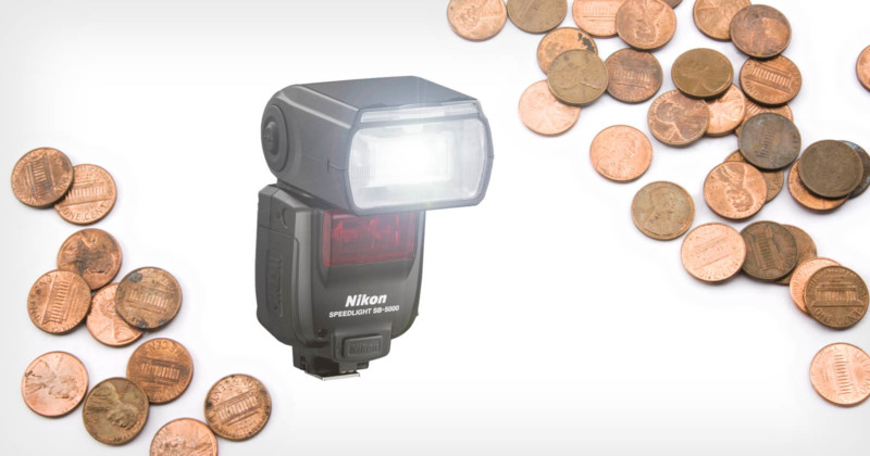 A Nikon camera flash surrounded by pennies A Nikon camera flash surrounded by pennies