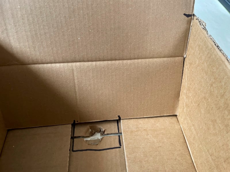 Measuring and marking a cardboard box for conversion into a DIY softbox Measuring and marking a cardboard box for conversion into a DIY softbox