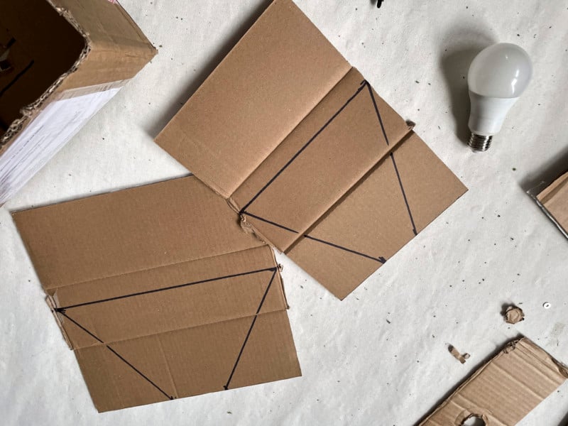 Pieces of cardboard with lines where cuts need to be made Pieces of cardboard with lines where cuts need to be made