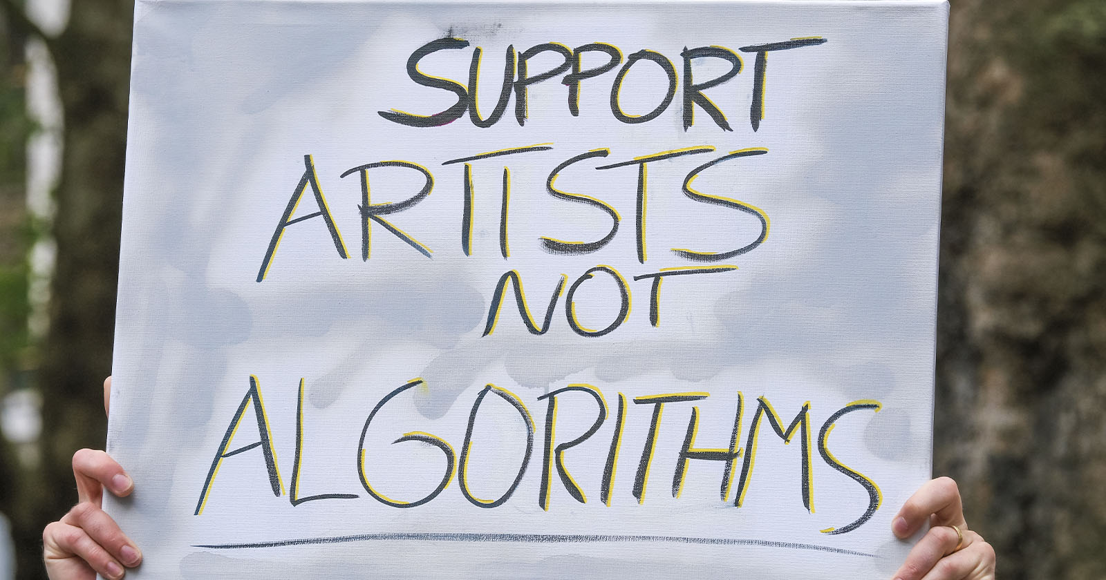 Sign that reads Support Artists not Algorithms