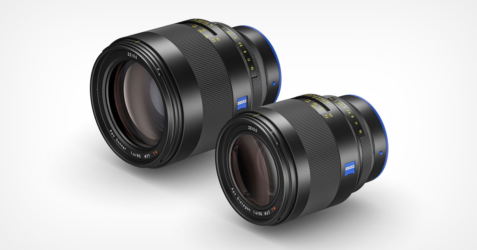 Two black camera lenses with blue accents are displayed against a white background. The lenses are marked with specifications and branding, featuring a sleek, modern design. One lens is larger than the other, both positioned at a slight angle. Two black camera lenses with blue accents are displayed against a white background. The lenses are marked with specifications and branding, featuring a sleek, modern design. One lens is larger than the other, both positioned at a slight angle.