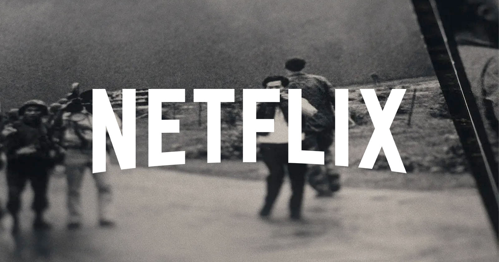 The word NETFLIX in bold white letters is superimposed over a blurred black-and-white photo of people walking outdoors. The word NETFLIX in bold white letters is superimposed over a blurred black-and-white photo of people walking outdoors.
